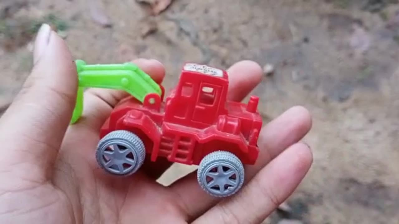 This colored toy is called a bulldozer