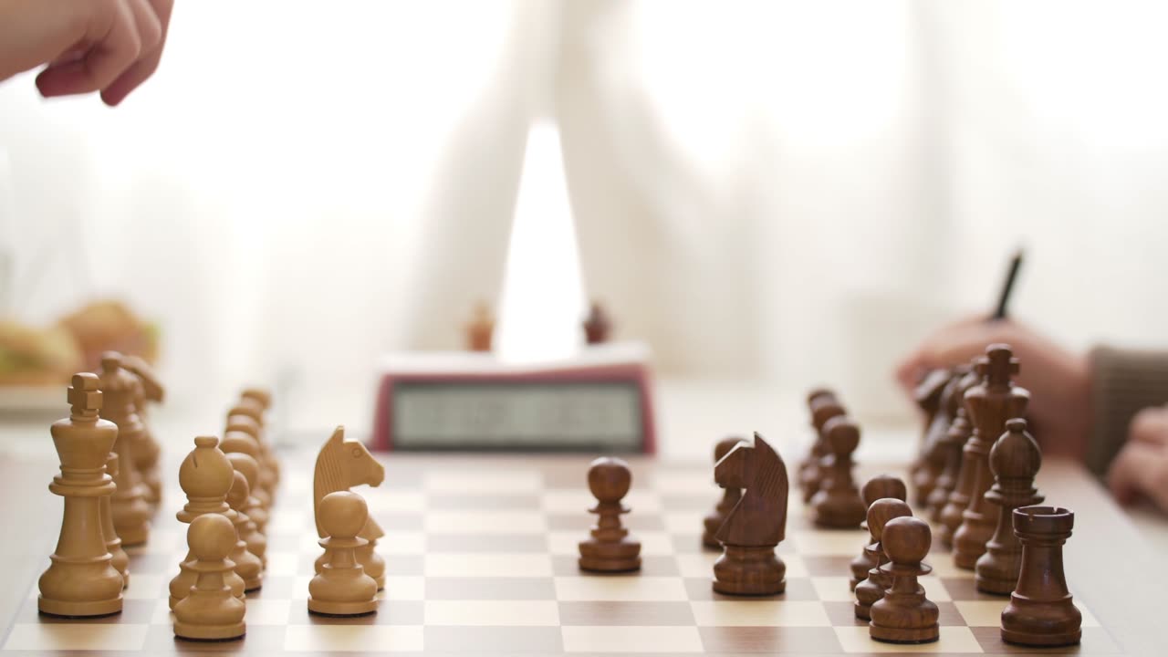 Two People Challenging Each Other in Chess