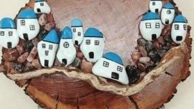 More artistic pebble art ideas/stone people wall painting