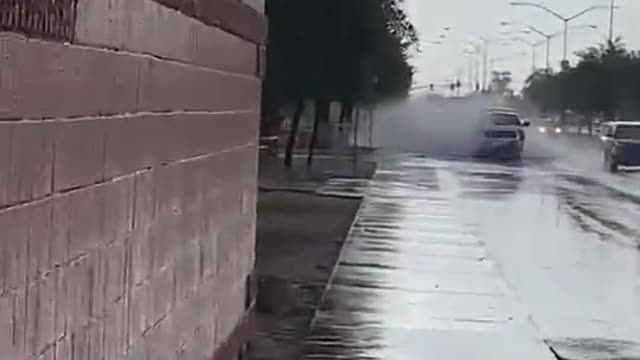 Pedestrian Showered by Passing Pick-up Truck