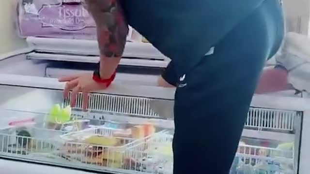 Man lies down in Taiwan supermarket freezer