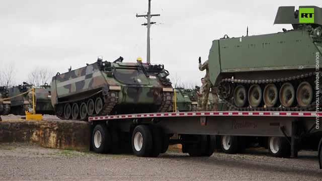 RT. US National Guard prepares military gear to send to Ukrainian forces