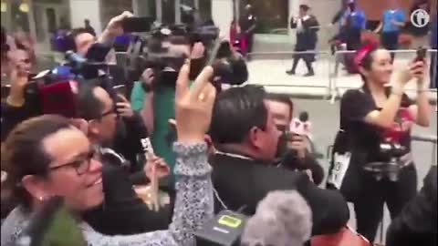 Mariachi band performs as part of protest outside Aaron Schlossberg's home