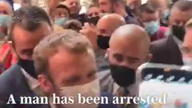 French president Emmanuel Macron egged by protester shouting "vive la revolution"