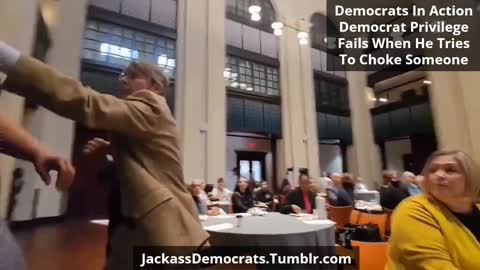 Democrats In Action - Democrat Tries To Choke Someone To Silence Them