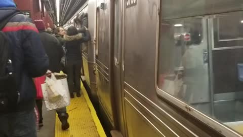 Guy comes out of subway through window door broken