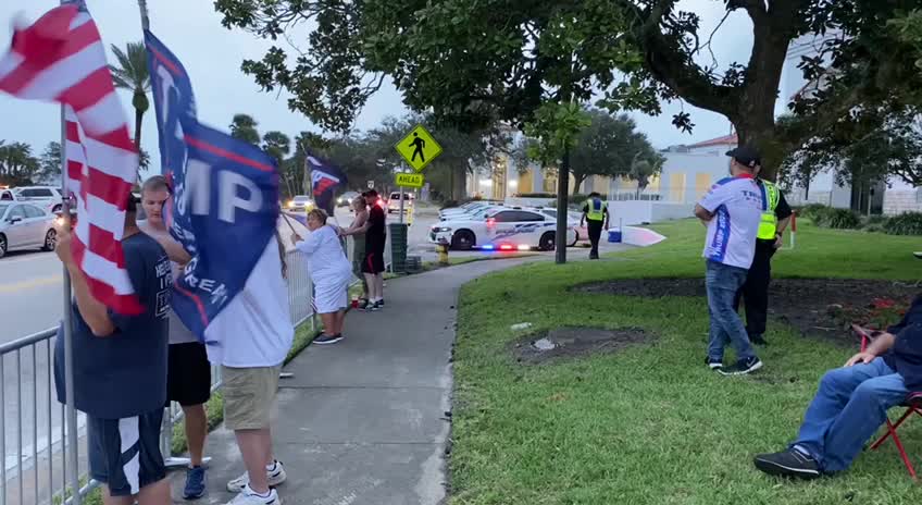 PATRIOTS WAIVING FLAGS IN ORMOND BEACH, FL