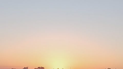 California sunrise with Moon in the sky