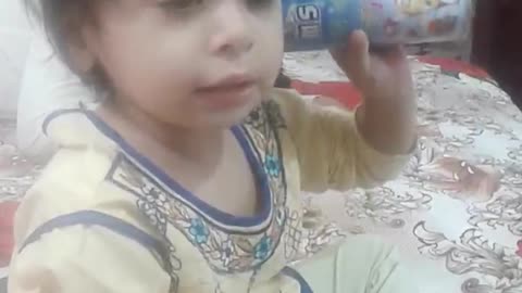 Cute Baby Playing with Spray