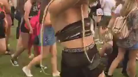 Music girl black shirt dancing in concert