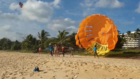 Paragliding on the beach.