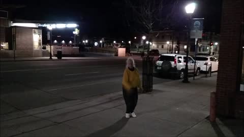 Midnight baton tossing by a beautiful older lady