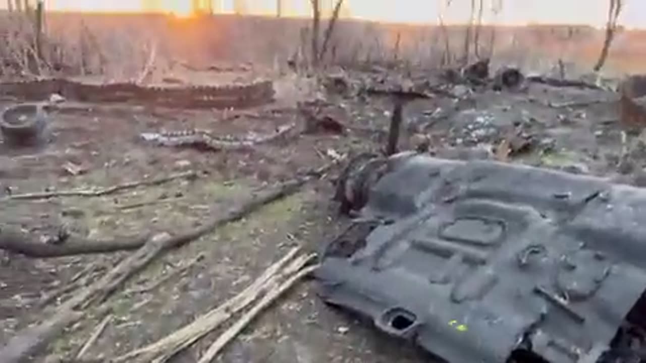 Russian serviceman showing what's left of the "Msta-S" SPG system destroyed