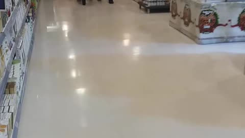 Santa Rides Motorcycle Through Store