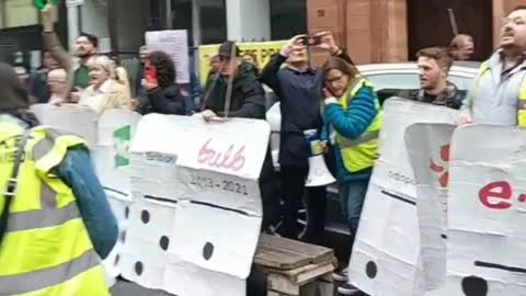 Scots burn electricity bills outside Ofgem energy regulatory building in Glasgow