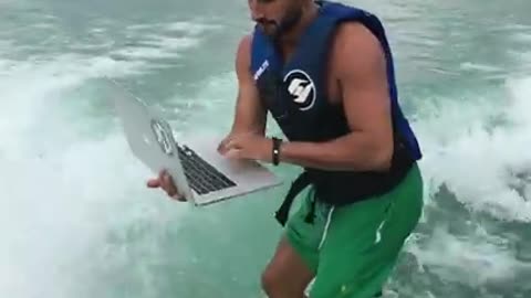 wake boarding with a laptop