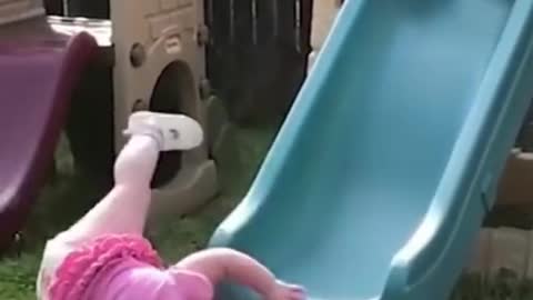 Cute baby playing in a garden 🏡