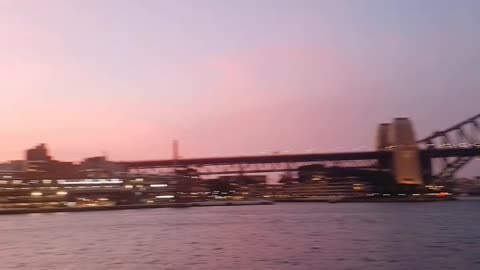 The sunset of the Opera House and Harbor Bridge.