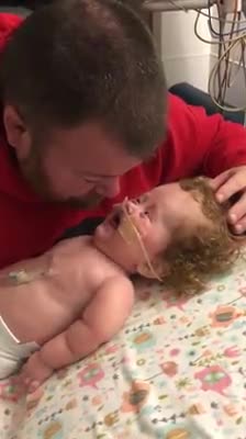 Toddler With Rare Disease Laughs With Dad And It'll Totally Melt Your Heart