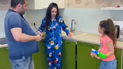 husband throws water at his wife lots of laughs