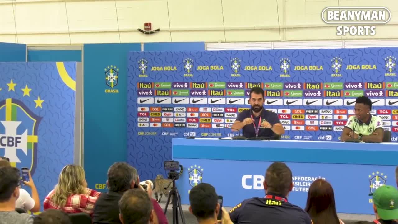 CRAZY moment a CAT interrupts Vinicius Jr's press conference! Press officer YEETS it!