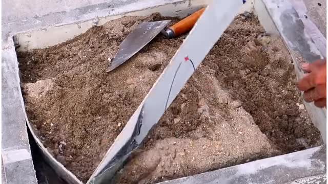 A simple yet stunning coffee table made with cement and tiles