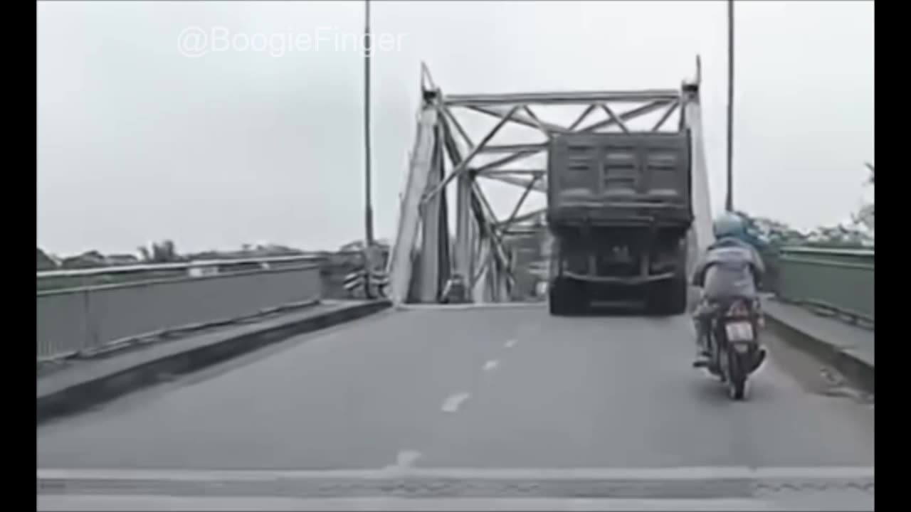 Biker vs Bridge: Dashcam video shows moment bridge collapses in Vietnam