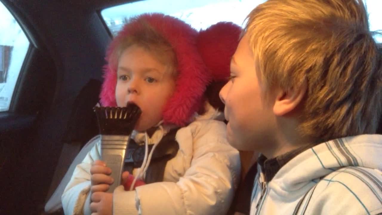 Little Sister Finishing Off The Ice Scraper.