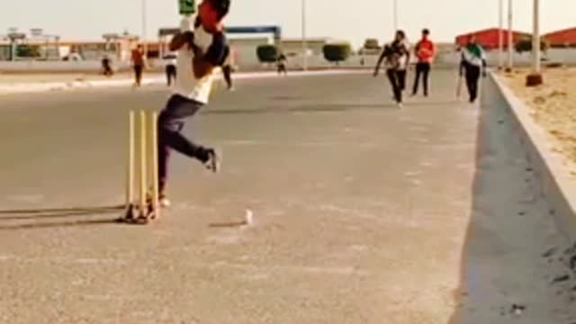 My friend play cricket Short