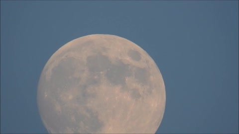 Moonrise During Sunset