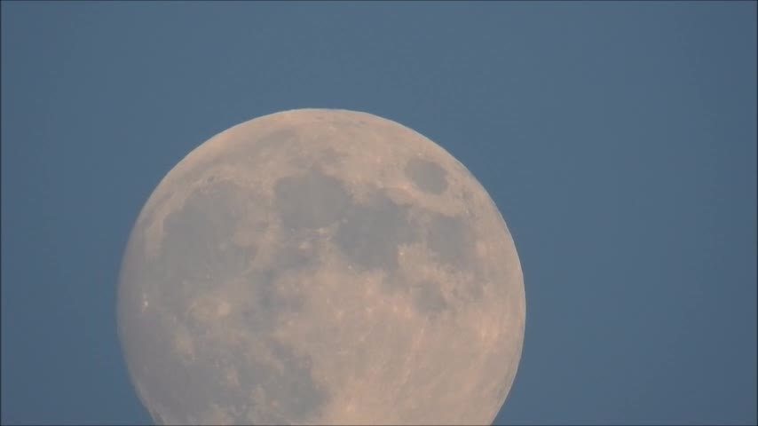 Moonrise During Sunset