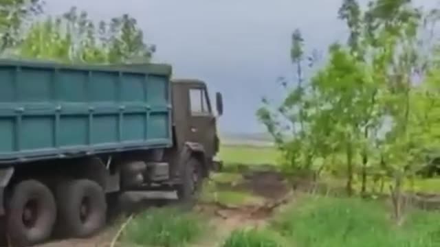 Russian truck attempted to drive over a ditch but was blown up by a Ukrainian mine