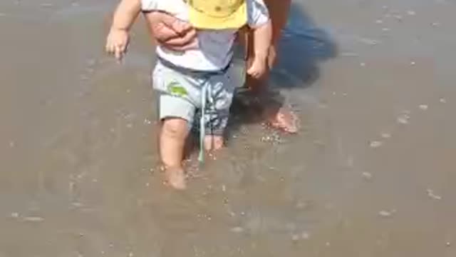 Cute baby in the beach