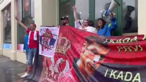 Protesters in Melbourne Novak Djokovic is being held captive