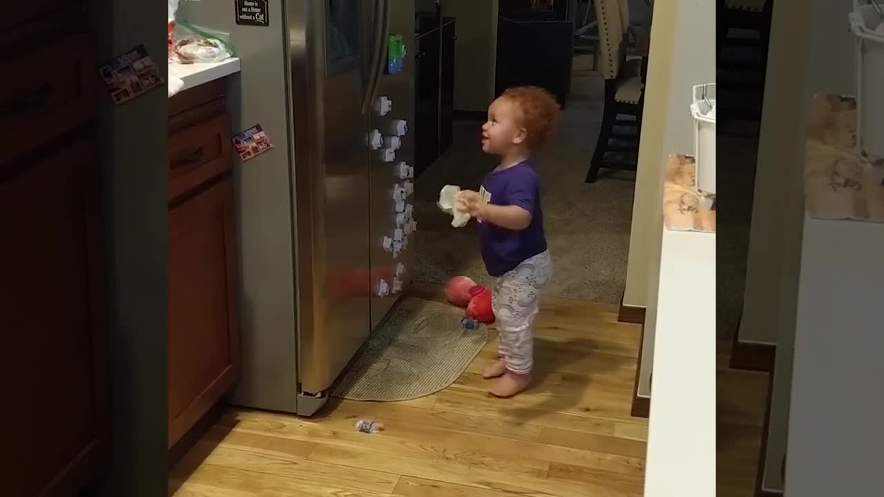 funny babies serve themselves from the fridge