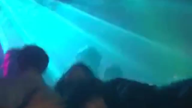 Nsfw drunk guy dances on red bull table and falls down