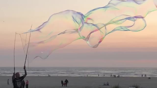 Giant bubble maker on seaside oregon beach