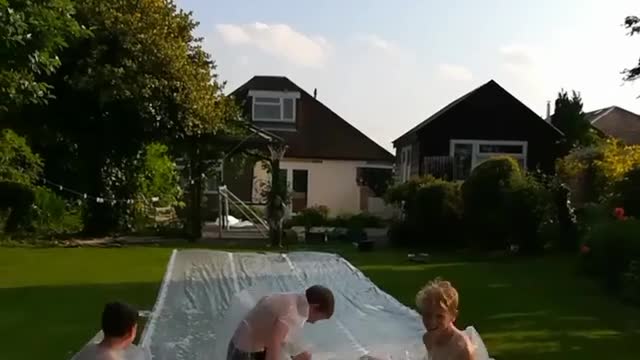 Collab copyright protection - five kids slip n slide backyard
