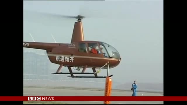 HOW TO OPEN A BEER BOTTLE WITH A HELICOPTER SKID - BBC NEWS