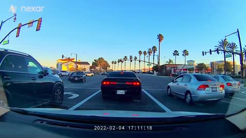 You're standing like this at a traffic light, and here...