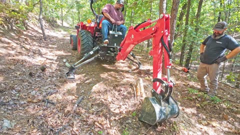 2515H Digging Stumps In Rocky Enviroment On Hill Sides