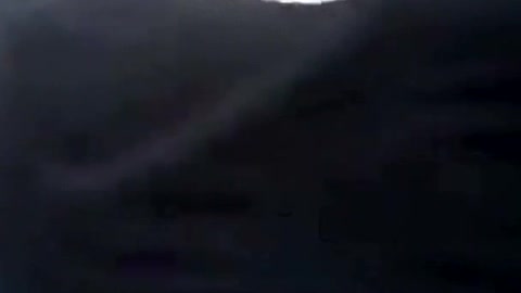A thief steals a TV reporter's phone during live coverage on the road