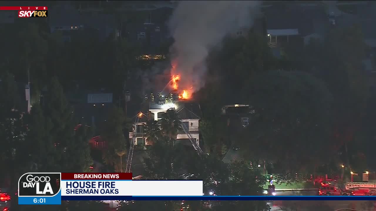 Crews battling large house fire in Sherman Oaks