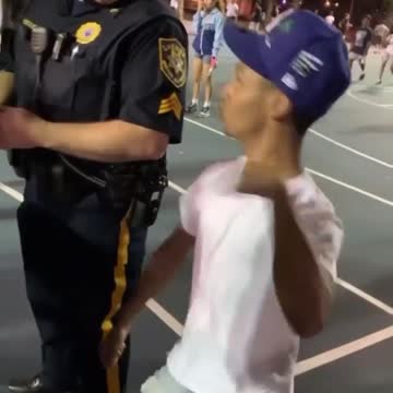 Dance battle between Street dancer and Cop