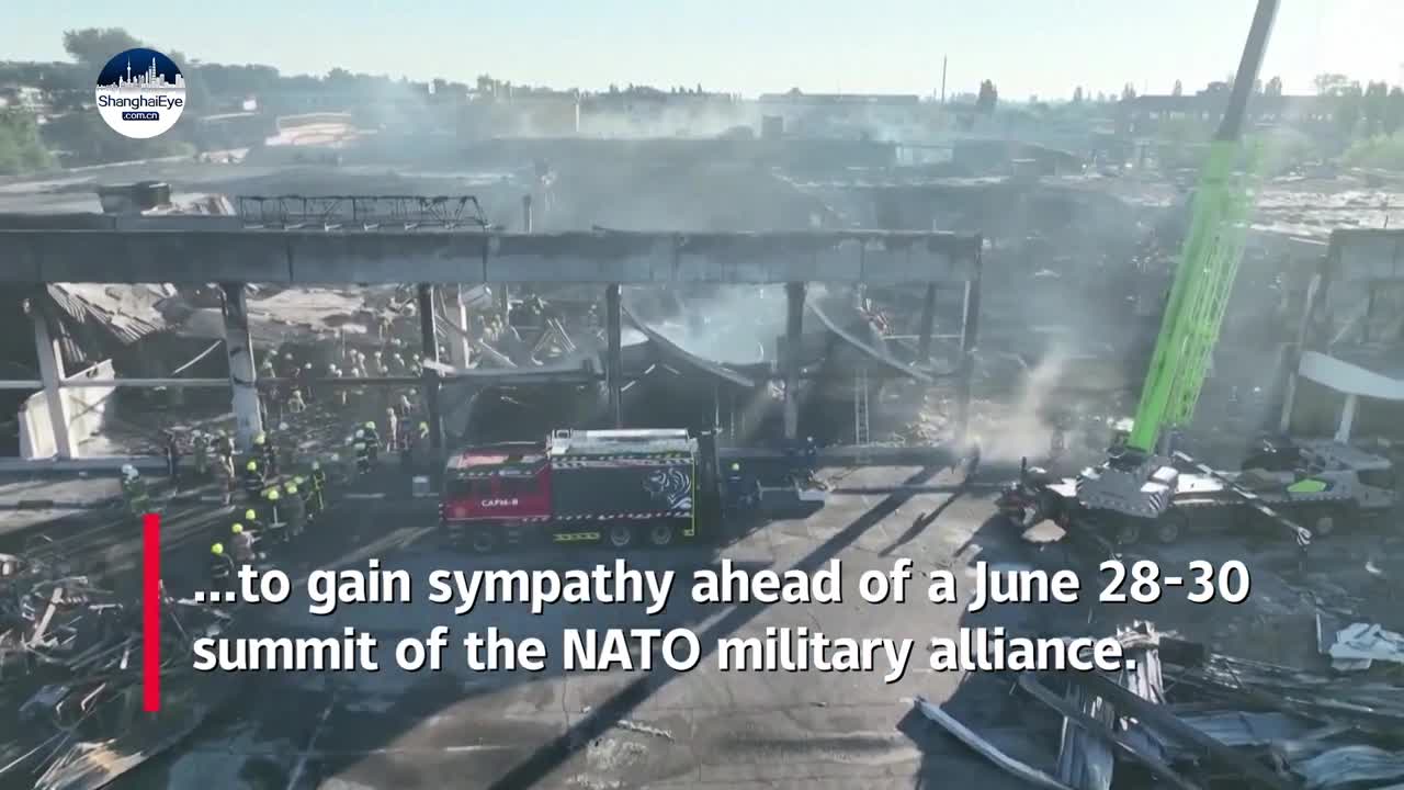 Drone footage of Ukraine shopping mall hit by missile strike showing smouldering remains