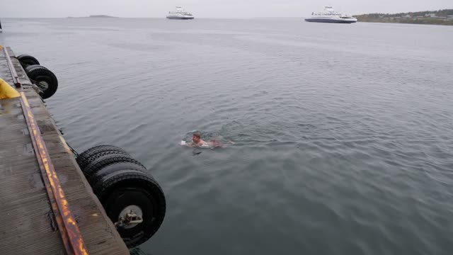 Man Dives 89 Feet from Container Crane