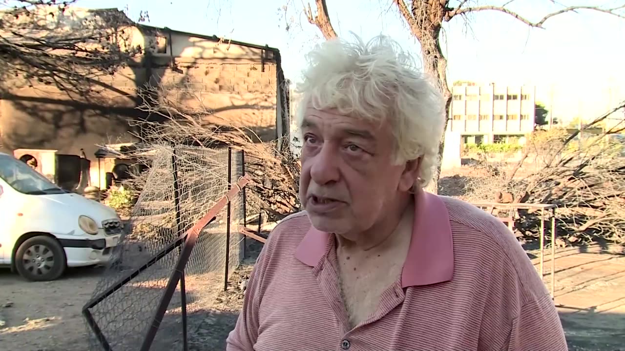 Residents of Athens suburb survey destruction after wildfire