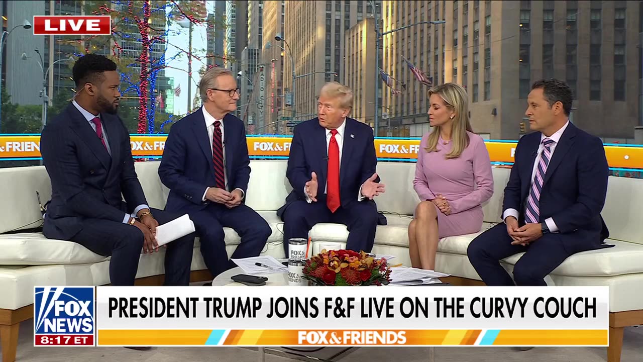 Trump joins Lawrence Jones at NYC barber shop 'I could have stayed for two hours'