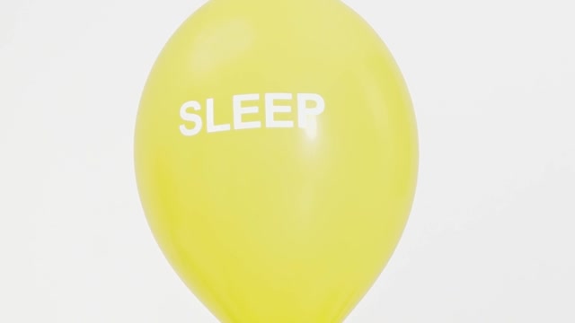 Word Sleep Printed on a Yellow Balloon