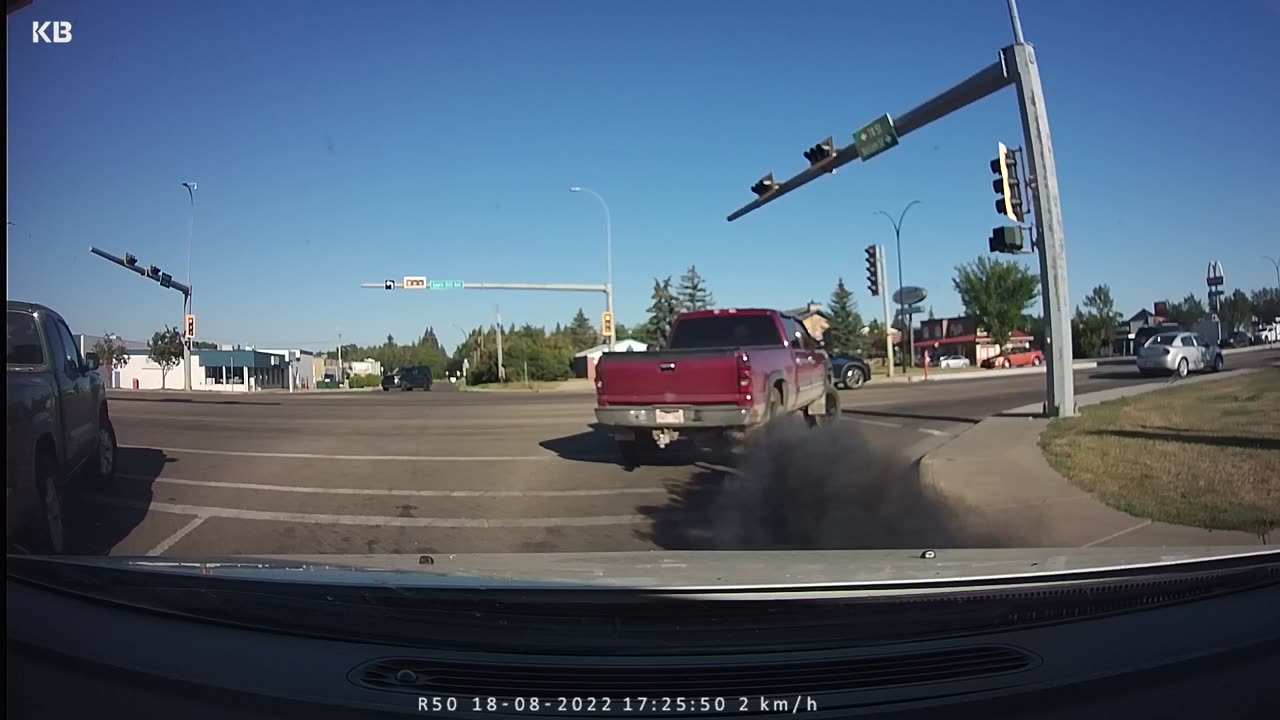 Red deer driver Chevy smoke